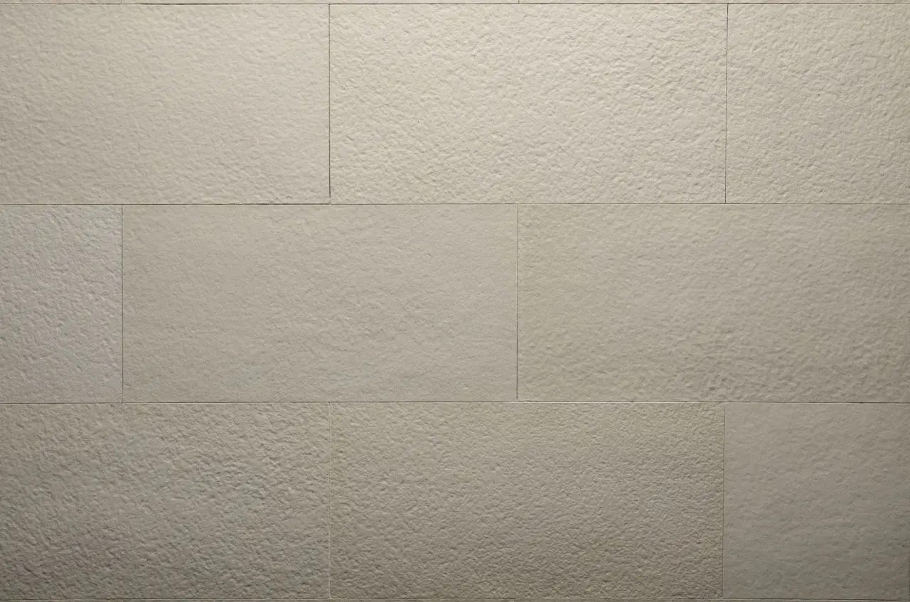Beige B02 Butcher Beige flexible tiles with a fine bush-hammered texture and staggered joints