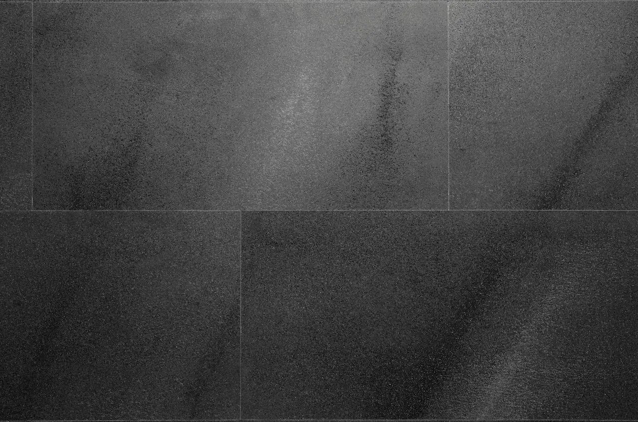 Dark grey M05 Royal Granite flexible tiles with mineral granules and soft lighter veining