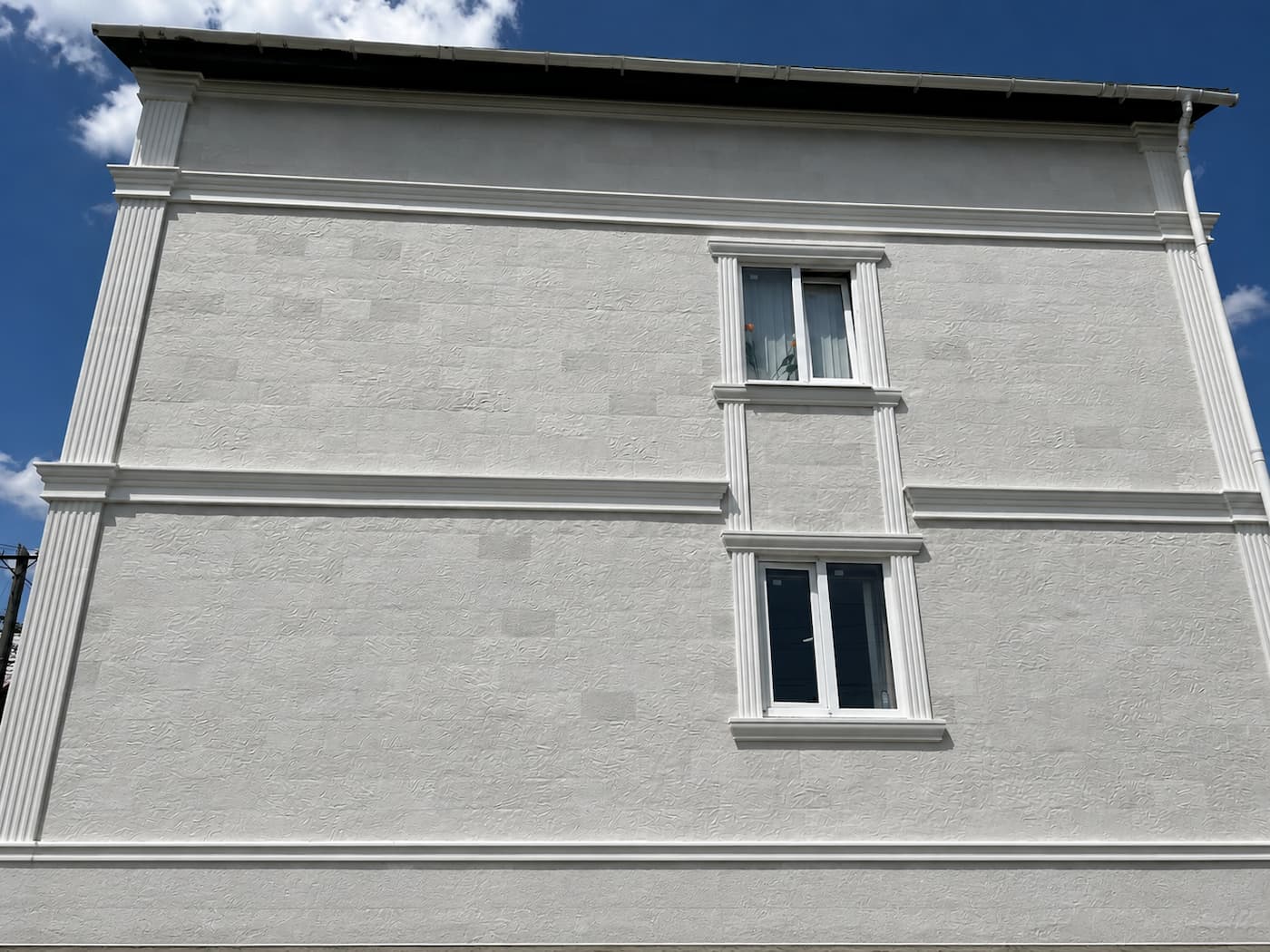 Private house in Telecentru — flexible stone facade — 2