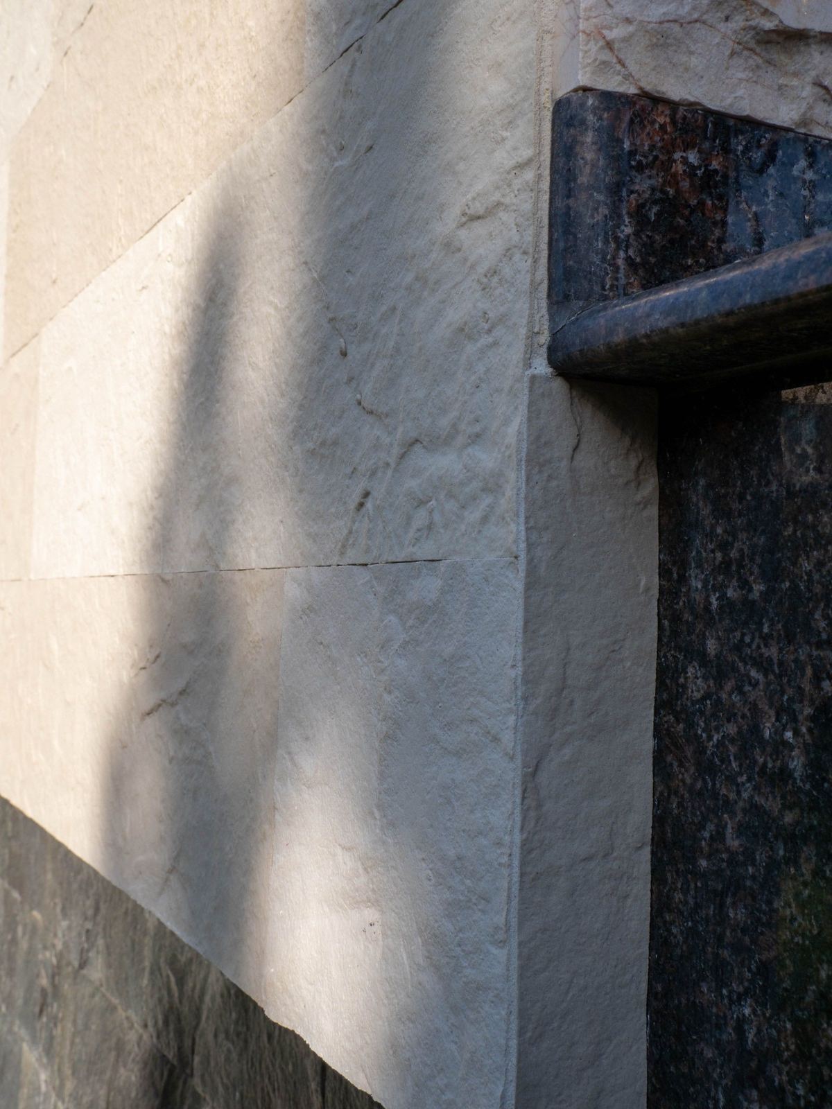 Corner with two planes clad in Tender Rock flexible stone, relief texture