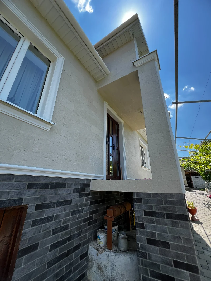 Malkoch — flexible stone facade of a private house
